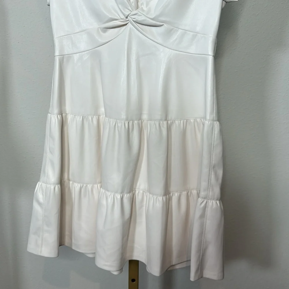 Alice and Olivia
Mila Faux Leather Twist Front Cap Sleeve Dress - Picture 9 of 10